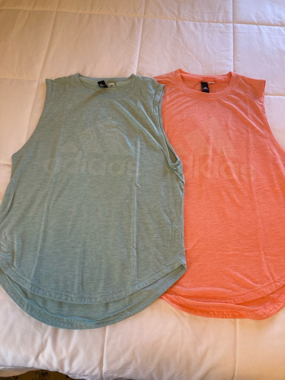 2 muscle tanks. Adidas size small.